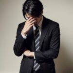 悩みを抱えた男性